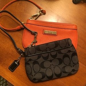 Both Coach and Calvin Klein wristlet bags